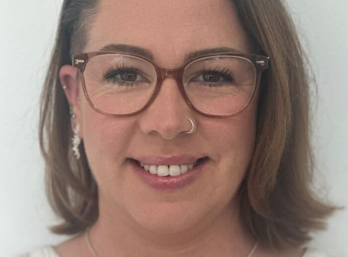 Adult orthodontic patient smiling
